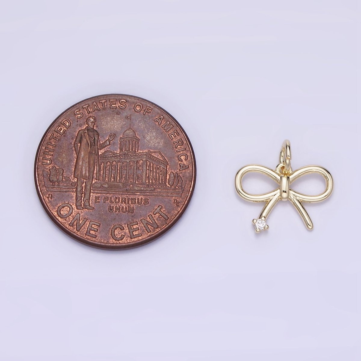 14k Gold Filled 11mm Mini Bow Ribbon CZ Charm | AG662 - DLUXCA