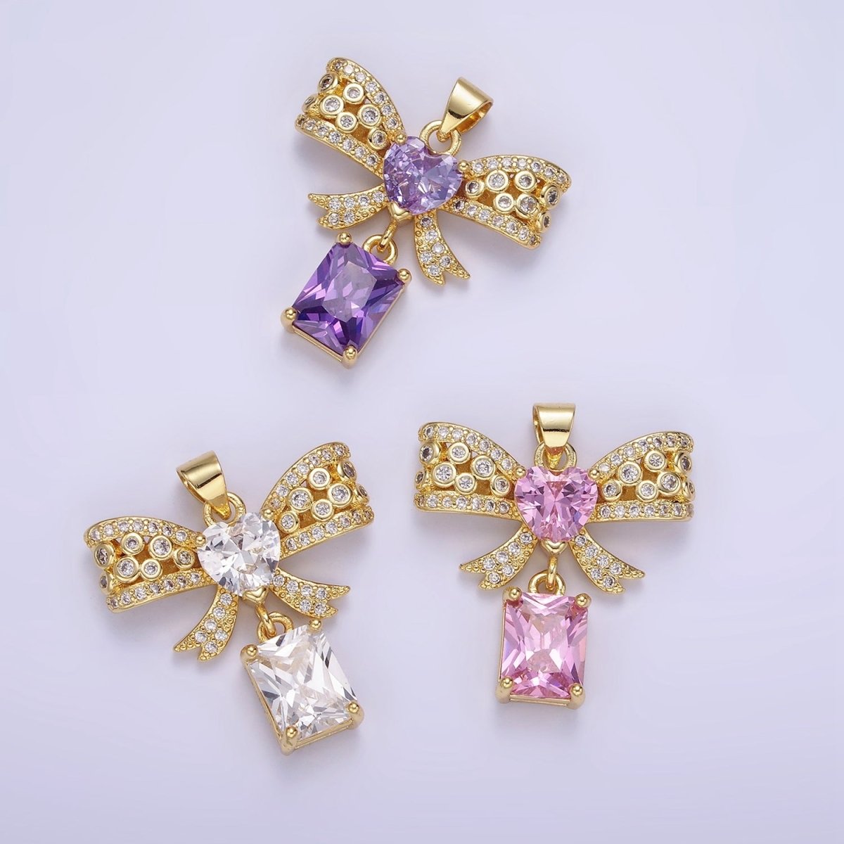 14K Gold Filled Clear, Pink, Purple Heart CZ Micro Paved Dotted Ribbon Bow Baguette Drop Pendant | AA1136 - AA1137