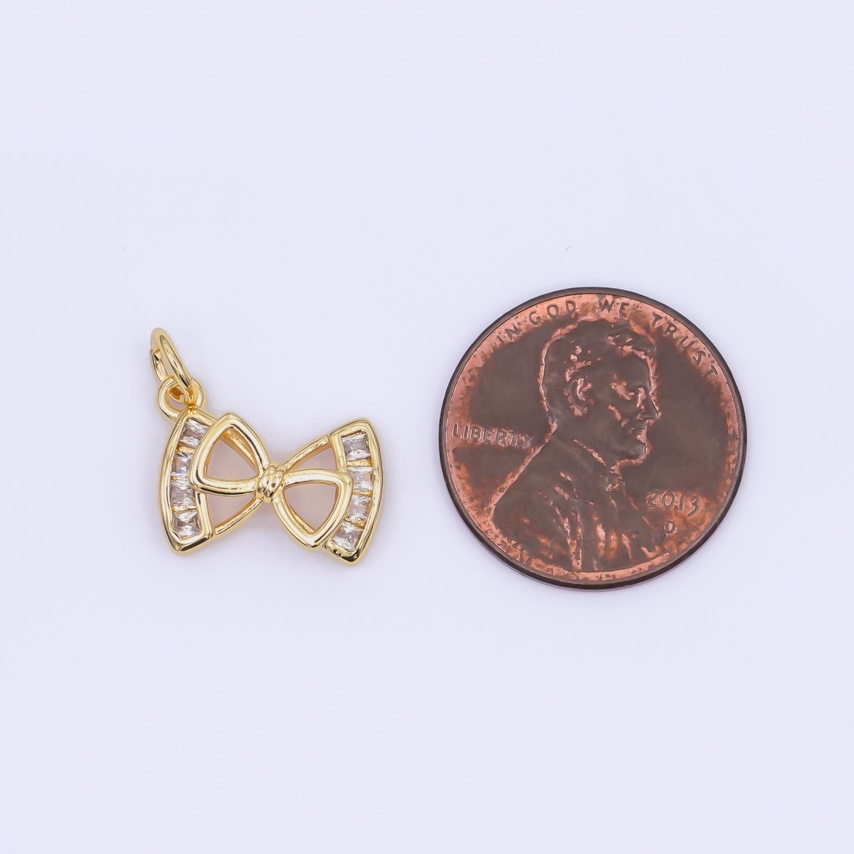24K Gold Filled Baguette CZ Open Ribbon Bow Charm | AJ296 - DLUXCA