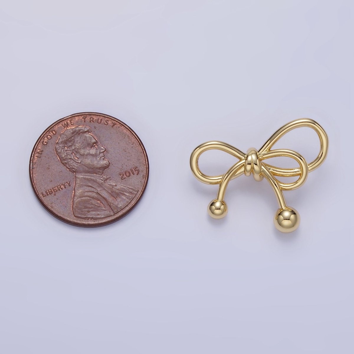 24K Gold Filled Double Tied Ribbon Bow Looped Back Pendant in Gold & Silver | H051