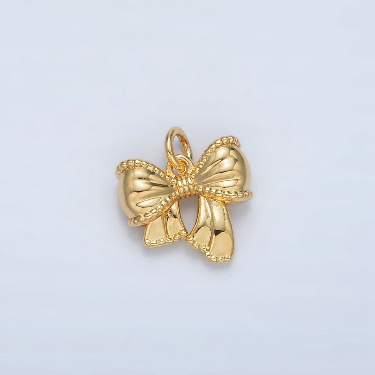 24K Gold Filled Textured Ribbon Bow Charm in Gold & Silver | AC144