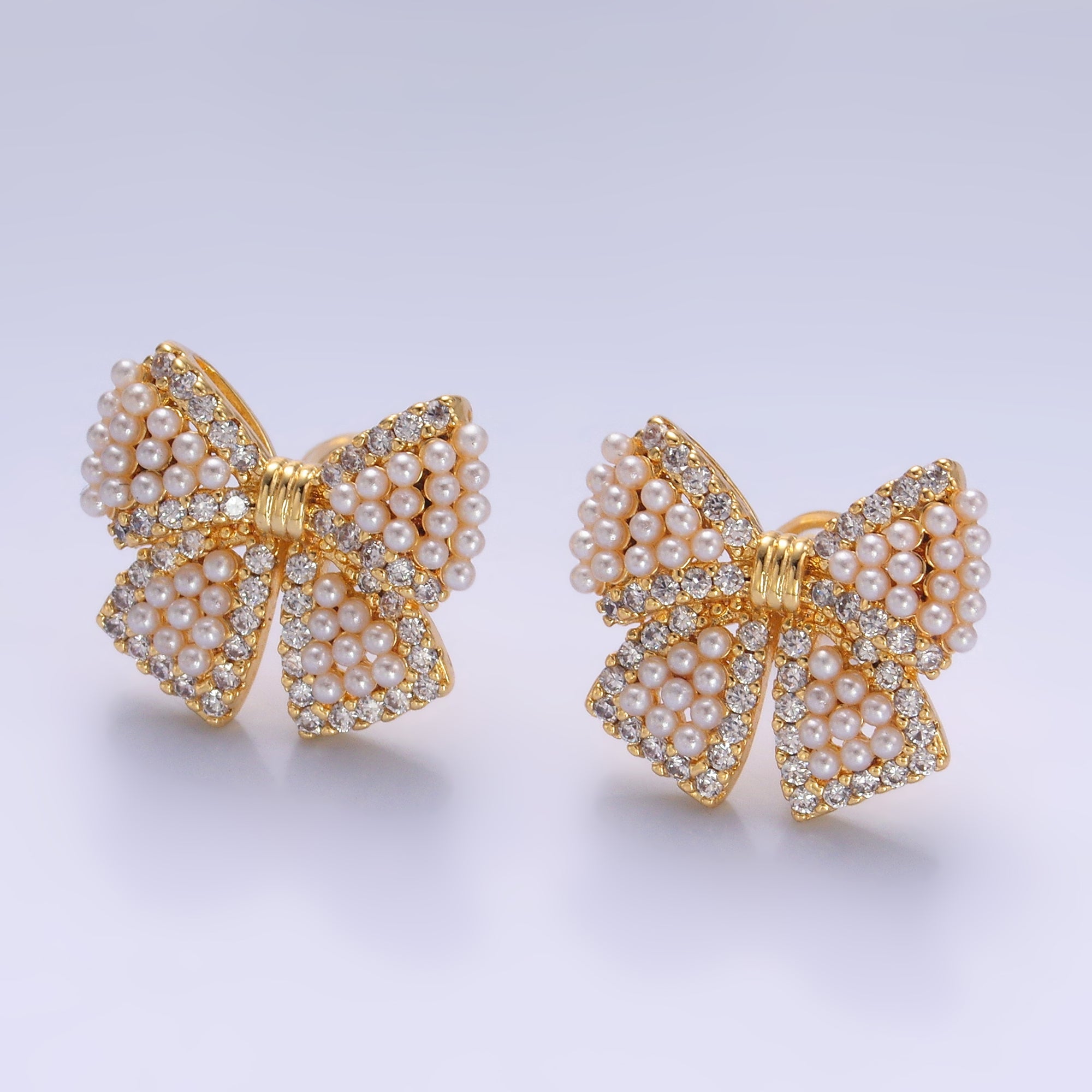 24K Gold Filled Shell Pearl Dotted Micro Paved CZ Ribbon Bow Stud Earrings in Gold & Silver | AB692 AB693