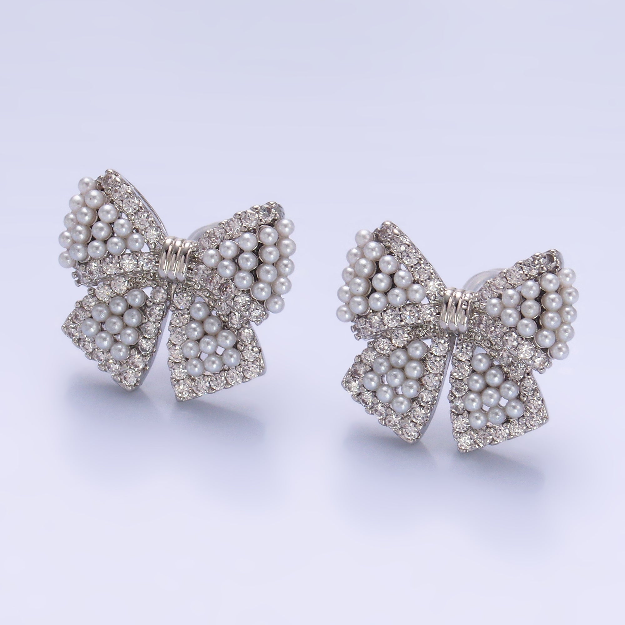 24K Gold Filled Shell Pearl Dotted Micro Paved CZ Ribbon Bow Stud Earrings in Gold & Silver | AB692 AB693