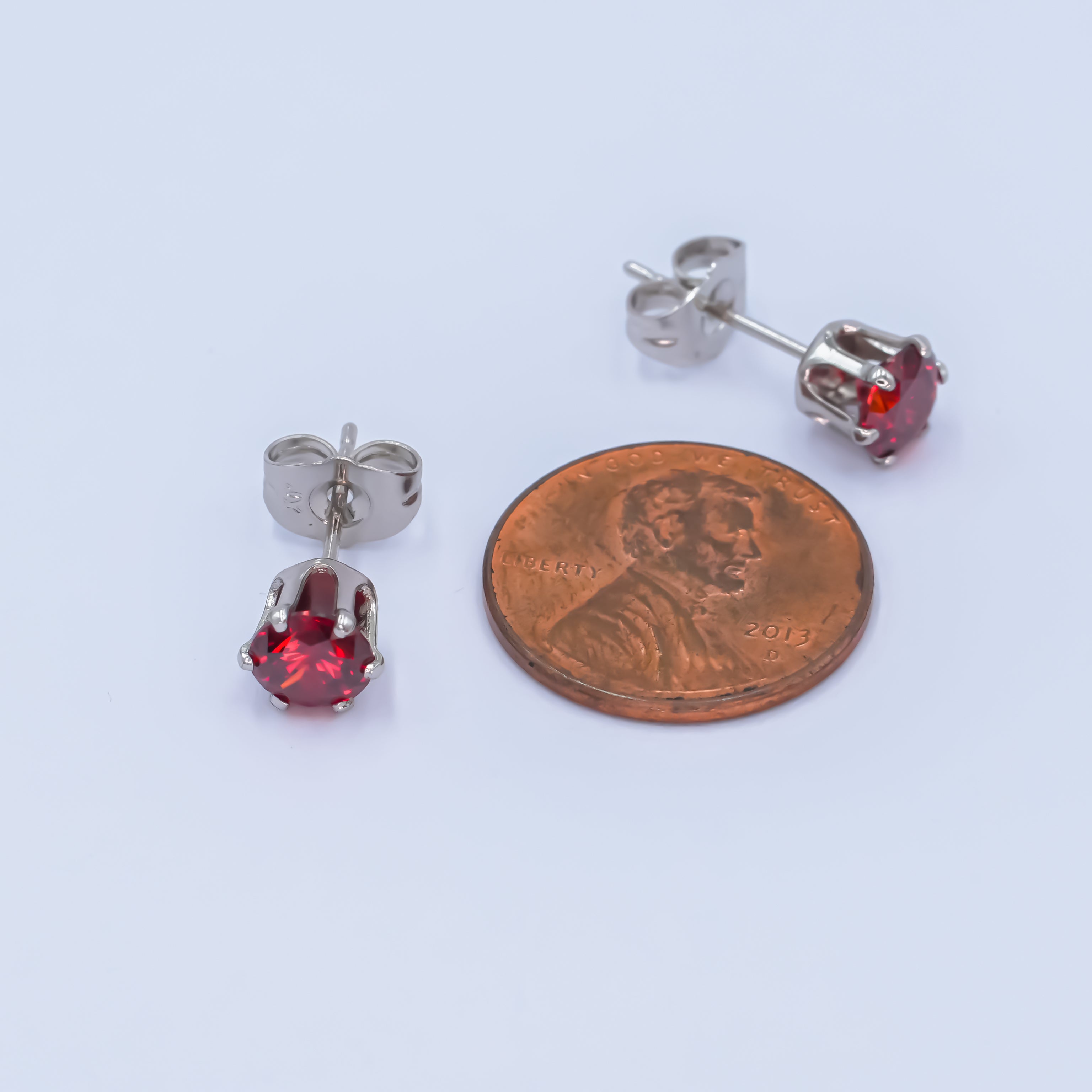 White Gold Filled 7mm Red CZ Mini Stud Earrings | AB1071