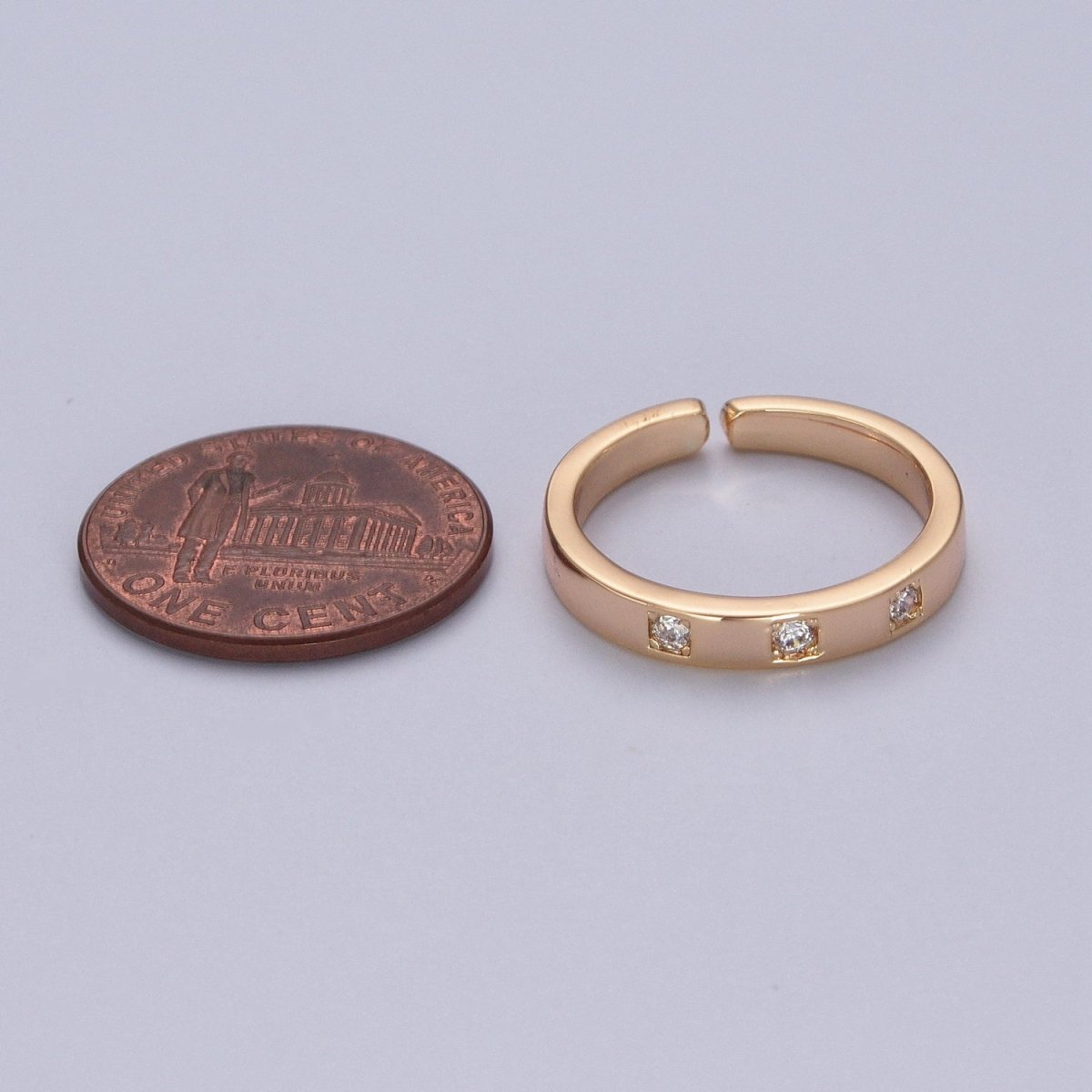 OS Minimalist Triple Three Clear Cubic Zirconia Adjustable Gold Ring U-309