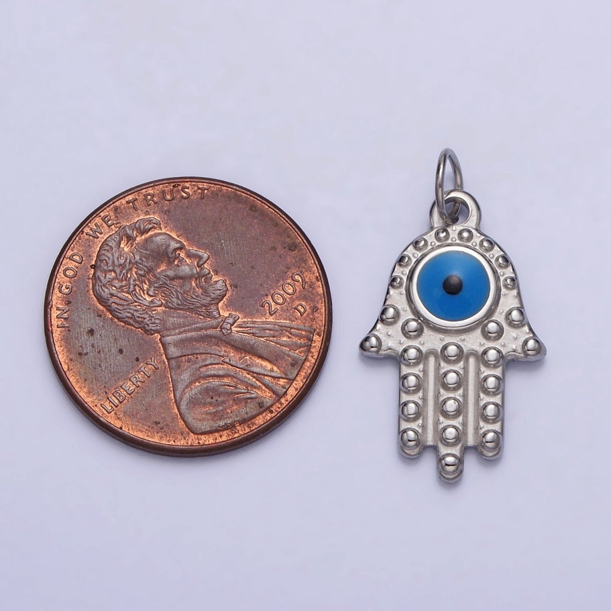 Stainless Steel Blue Evil Eye Dotted Hamsa Hand Charm in Gold & Silver | P-1230